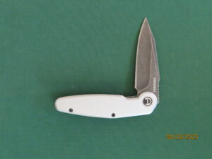 Crescent folding knife
